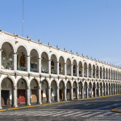 Building with arches on Plaza de Armas in Arequipa, Peru