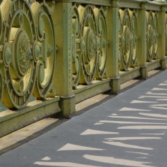 Railing of the Pont Mirabeau. The pont Mirabeau in Paris was built between 1895 and 1897. It was listed a historical monument in 1975