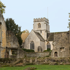 Church of Minster Lovell in Cotswold village with graveyard