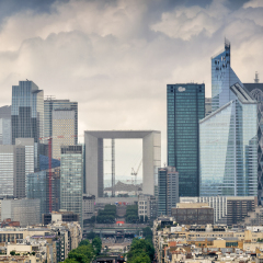Business district of Paris. La Defense, aerial view on a cloudy day.