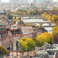 Beautiful architecture of central Paris with river Seine and La Defense business dictrict 
