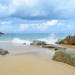 Rocks sea with sky background on Laem Singh Beach,Phuket Thailand