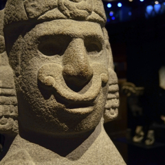 An ancient idol head in a museum of Quai de Branly in Paris