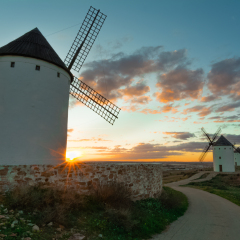 View of traditional windmills at sunset, Alcazar de San Juan, Ciudad Real, Spain 