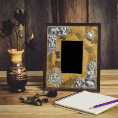 Still life picture frames, vases, dried rose notebook concept frequent memories.