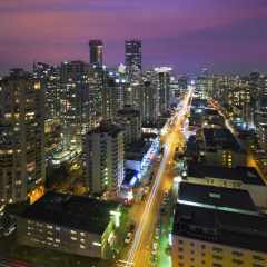 Vancouver British Columbia Canada Cityscape along Robson Street at  Night Aerial View