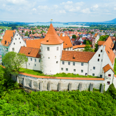 Hohes Schloss Fussen or Gothic High Castle of the Bishops aerial panoramic view, Germany. Hohes Schloss lies on a hill above Fuessen old town in Swabia.