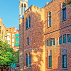 Facade of Hospital de Sant Pau in Barcelona in Spain. In English it is called as Hospital of the Holy Cross and Saint Paul. It used to be a hospital. Now it is a museum