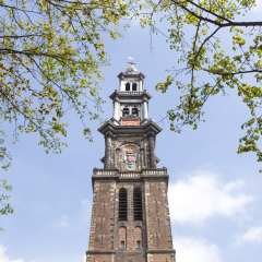 tower of westerkerk in dutch capital of amsterdam on a sunny day in spring