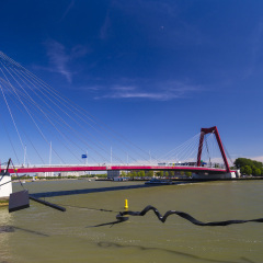 Willemsbrug Bridge during a clear sunny day in Rotterdam, Netherlands