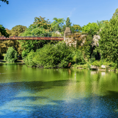Parc des Buttes-Chaumont - Public Park situated in northeastern Paris. It was opened in 1867; it is fifth-largest park in Paris. 63-meter-long suspension bridge, designed by Gustave Eiffel in 1867.