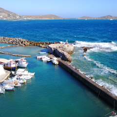 Spring 2017: Aerial bird's eye view photo taken by drone of iconic and picturesque port of Naousa village, Paros island, Cyclades, Greece