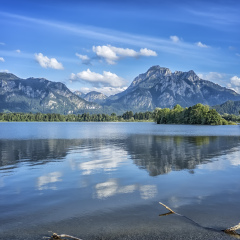 An image of a view to Neuschwanstein at Forggensee lake