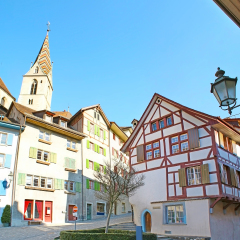 The twisted hilly Obere Halde street with numerous half-timbered houses connects the center of old town with embankment of Limmat river, Baden, Switzerland.