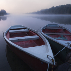 Boats on the Cow Lake in Augsburg at sunrise