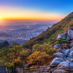 Sunrise at Baegundae peak and Bukhansan mountains in autumn,Seoul in South Korea.