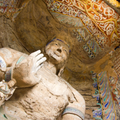 DATONG, CHINA - SEPTEMBER 9, 2011: Statues in the Yungang caves in Datong on September 9, 2011.  These ancient Buddhist temple grottoes (5th and 6th century) are composed of more than 51,000 statues 
