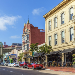 SAN DIEGO, USA - JUNE 11, 2012: facade of historic houses in the gaslamp quarter in San Diego, USA. The area is a historic district on the National Register of Historic Places and dates back to 1867.