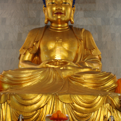 Buddha Holding Pagoda - inside of the Bright Hill Temple (Kong Meng San Phor Kark See Monastery) in Singapore