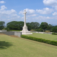 white crucifix in cemetery