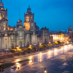 Metropolitan Cathedral and President's Palace in Zocalo, Center of Mexico City Mexico Sunrise night.