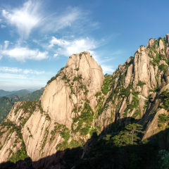 Lotus peak in the very early morning in famous Huangshan ("Yellow mountains"), Anhui, China. Yuping cable car visible at the bottom.