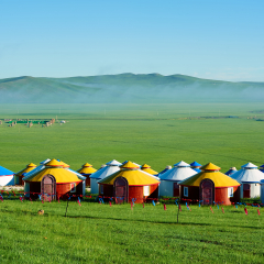 The mongolian yurts in summer grassland of Hulunbuir of China sunrise.	