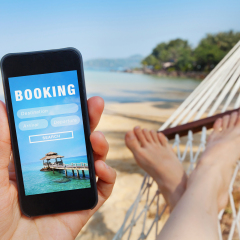 travel booking, hotels and flights reservation on the screen of smartphone