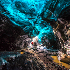 Ice Cave in Vatnajokull, Iceland.The beauty of the caves filled with blue ice.