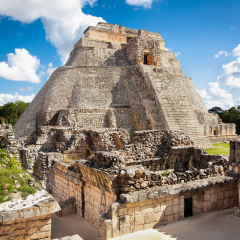 Pyramid of the Magician (Piramide del adivino) in ancient Mayan city Uxmal, Mexico