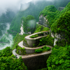 The winding road of Tianmen mountain national park (Zhangjiajie) in clouds mist, Hunan province, China