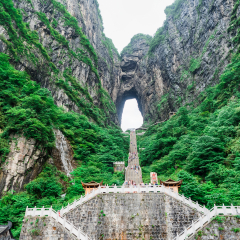 The Tianmen Mountain with a view of the cave Known as The Heaven's Gate and the steep 999 stairs at Zhangjiagie, Hunan Province, China, Asia