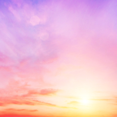 The blur pastels gradient sunset background on soft nature sunrise peaceful morning beach outdoor. heavenly mind view at a resort deck touching sunshine, sky summer clouds.