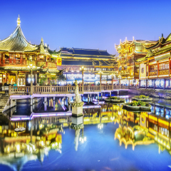 Shanghai at night. Pavilions and teahouses in the Chenghuang Miao area, Zigzag Bridge. Shanghai City, China.