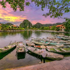 Rowing boat Waiting for passengers at sunrise,Hoa Lu Tam Coc,Hoi An Ancient Town,Vietnam.