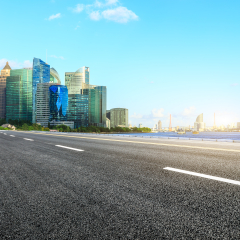 Asphalt road passes through Shanghai Lujiazui Financial District