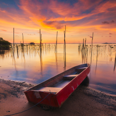 Traditional Boat in sunrise Sembulang Beach Batam Island, Amazing Sunset 