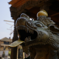 Dragon head guarding Tal Barahi Temple, Lake Phewa, Pokhara, Nepal