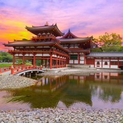 Uji, Kyoto, Japan - famous Byodo-in Buddhist temple with peaple at sunset time