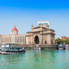 The Gateway of India and boats as seen from the Mumbai Harbour in Mumbai, India