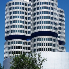 MUNICH, GERMANY -5 JUNE 2015- Opened in 1973, the BMW four cylinder tower (BMW Hochhaus Vierzylinder) is the world headquarters of German auto maker BMW.