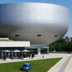 MUNICH, GERMANY -5 JUNE 2015- Opened in 1973, the BMW four cylinder tower (BMW Hochhaus Vierzylinder) is the world headquarters of German auto maker BMW.