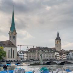 ZURICH - OCTOBER 8: Landmark viewpoint of Zurich, Two towers of Fraumunster and Saint Peter church, under cloudy sky in Zurich, Switzerland, on October 8, 2016.
