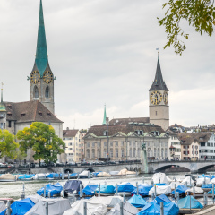 ZURICH - OCTOBER 8: Landmark viewpoint of Zurich, Two towers of Fraumunster and Saint Peter church, under cloudy sky in Zurich, Switzerland, on October 8, 2016.