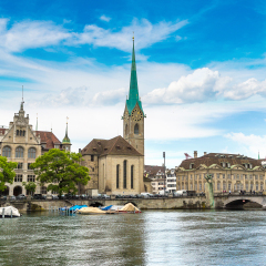 Clock tower of the Fraumunster Cathedral in historical part of Zurich in a beautiful summer day, Switzerland