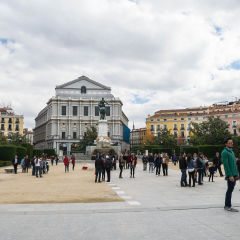 MADRID, SPAIN - 1 NOVEMBER 15 : People in the Plaza Oriente and view of the Royal Theatre (Teatro Real). Madrid is a popular tourist destination of Europe
