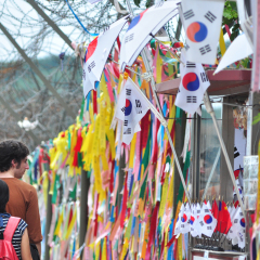 August 19, 2011 Imjingak in Paju South Korea, Prayer ribbons tied to the fence left by visitors wishing peace and unification for North and South Korea. Taken in Demilitarised Zone 