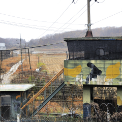 PAJU, SOUTH KOREA- NOVEMBER 14: DMZ Zone (South Korea): South Korean soldiers guarding by the Freedom Bridge watching border, November 14, 2015 Paju, South Korea