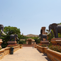 SUN CITY, SOUTH AFRICA - OCTOBER 29: Gigantic elephant statues on fluttering Bridge of Time in famous resort on 29 October in Sun City, South Africa