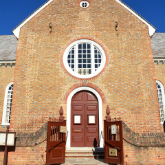WILLIAMSBURG, VIRGINIA - NOVEMBER 19 2014: Bruton Parish Church located in the restored area of Colonial Williamsburg Virginia, United States on Duke of Gloucester Street.. 